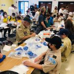 Ukrainian Scouts from Washington making vacuumed sealed PFAKs for Ukraine